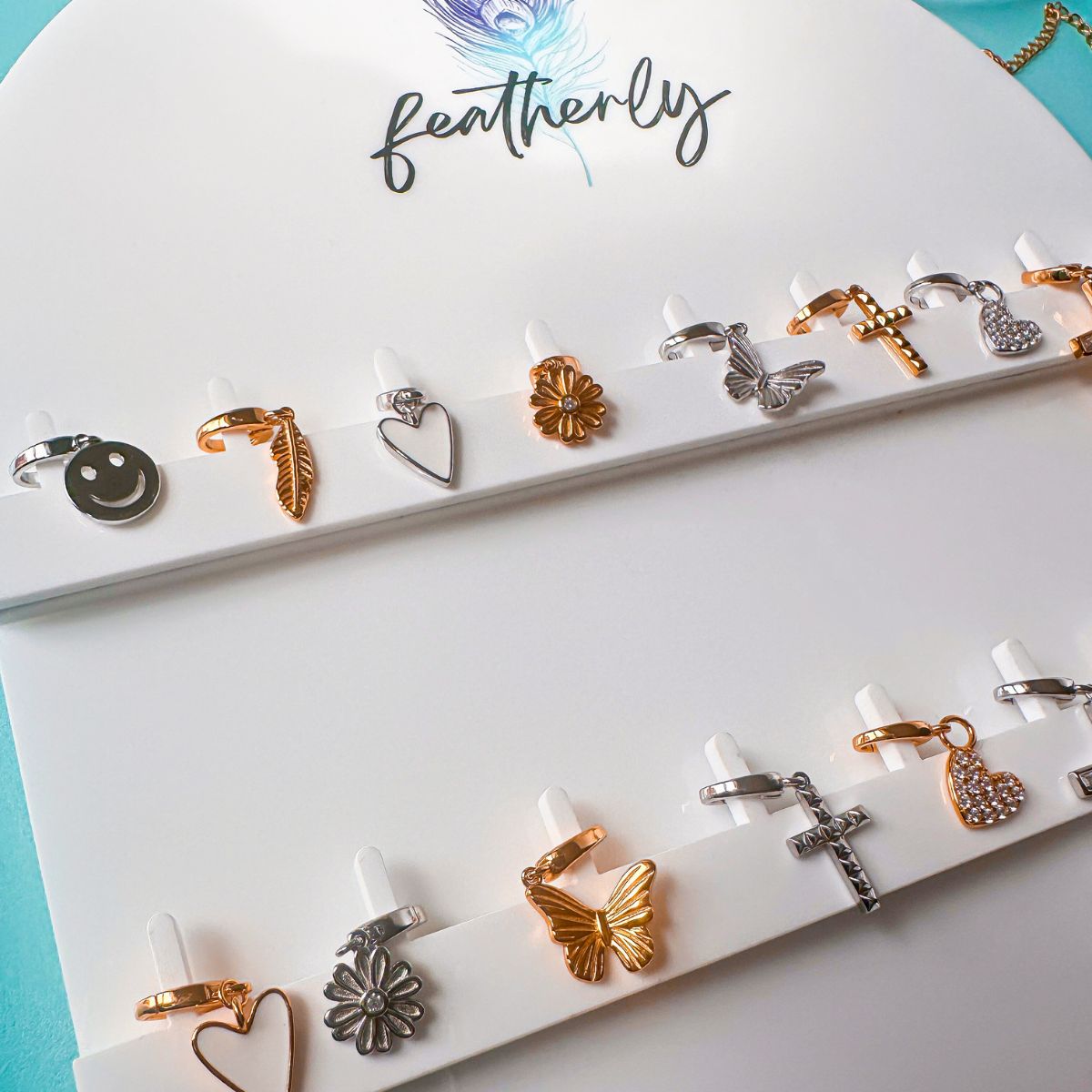 bracelet charms and charms for a necklace that clip on from Featherly jewelry