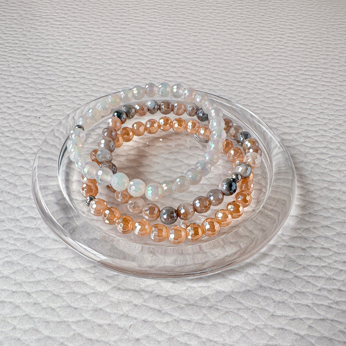 Featherly beaded bracelet bundle featuring stack of 3 bracelets