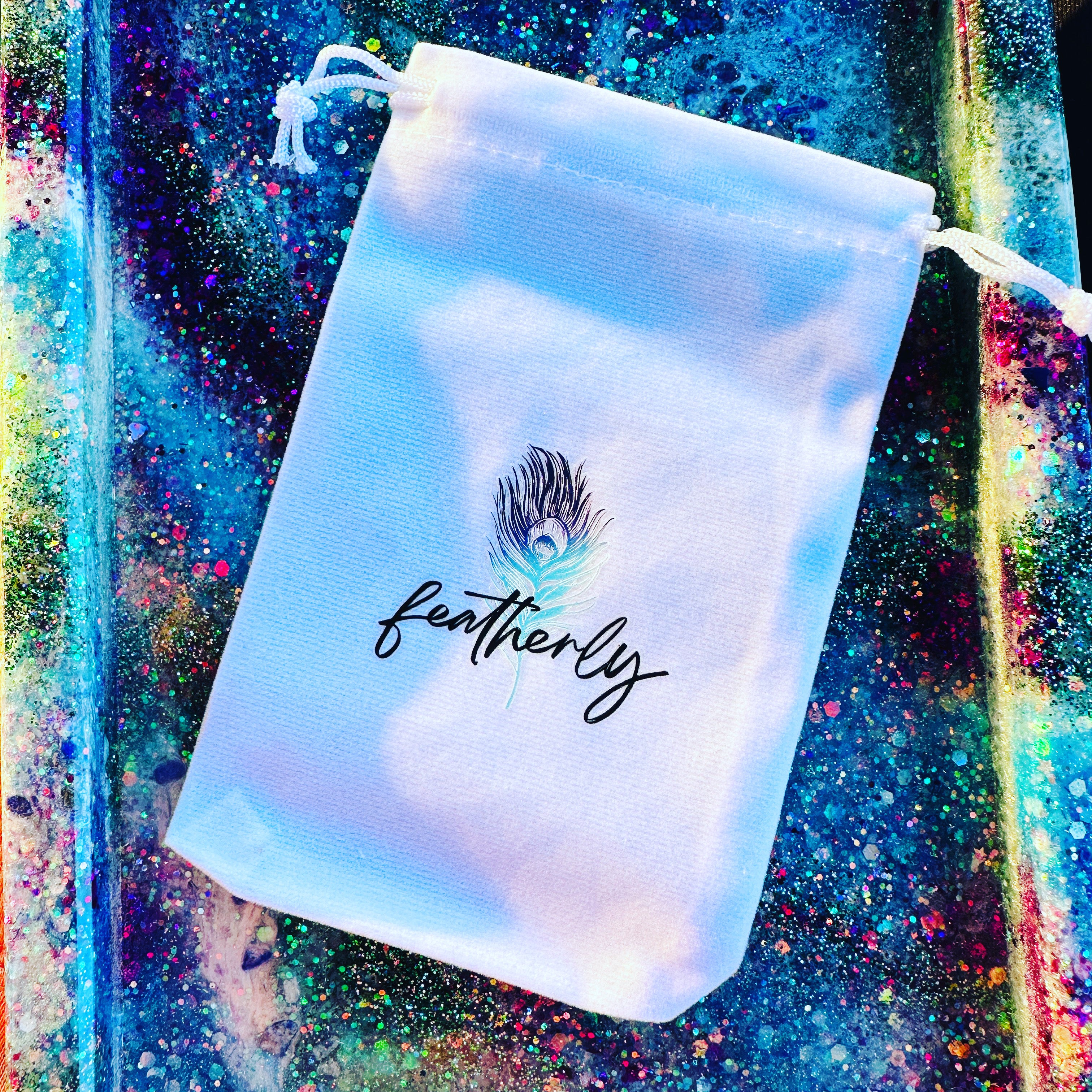 Featherly Merch & Accessories