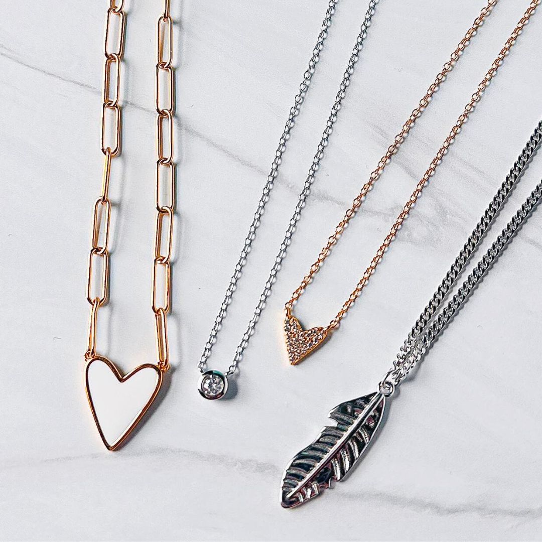 Gold and sterling silver necklaces from Featherly including heart necklaces, cz necklace and feather necklace