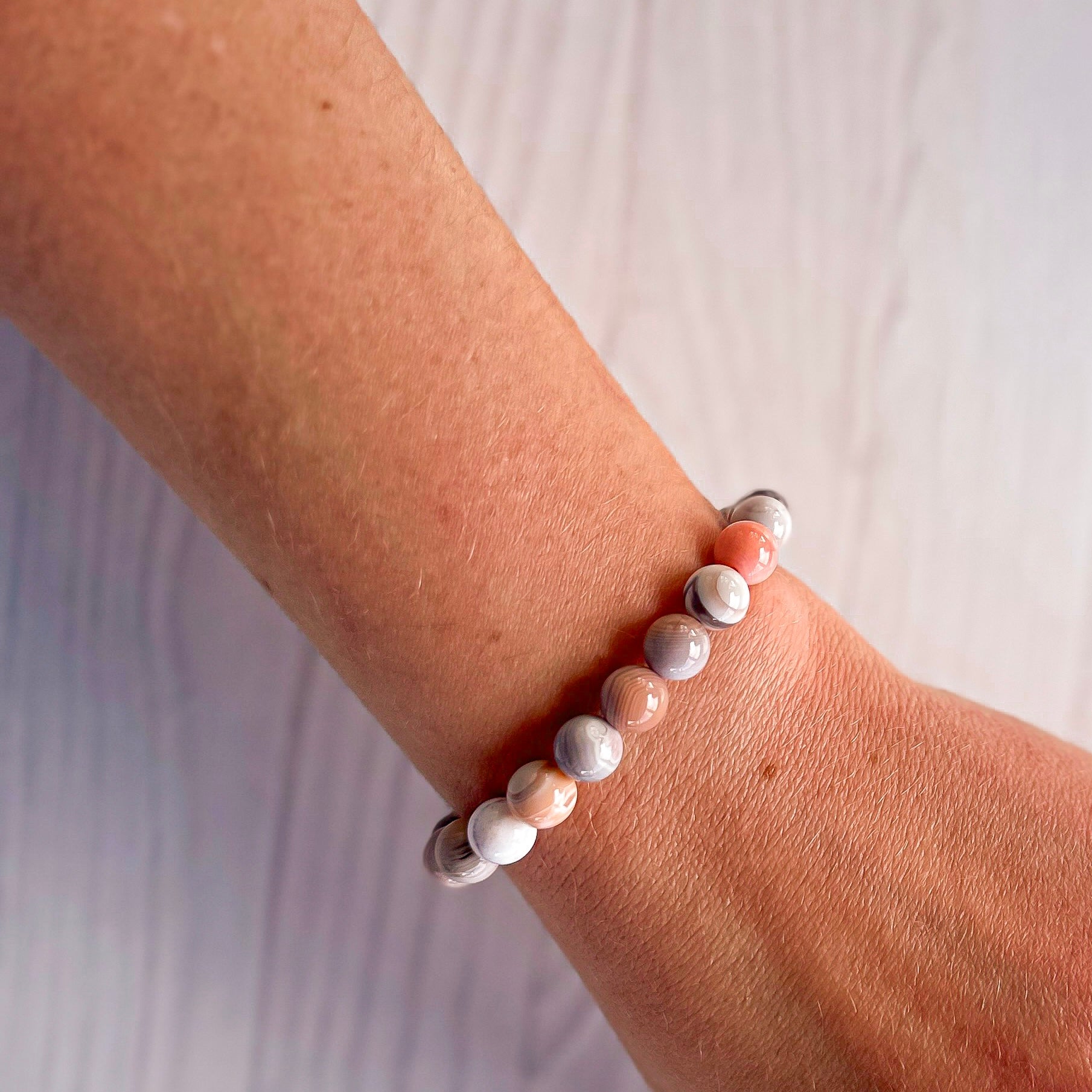 stacker bracelet from featherly in pink botswana agate