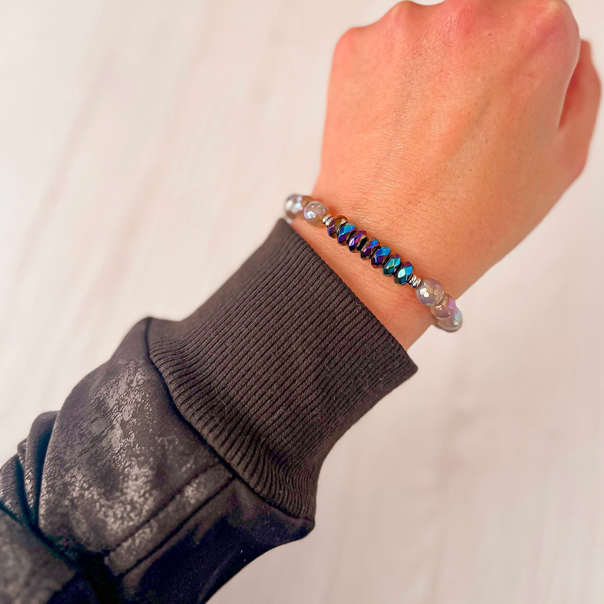 Featherly Rainbow Black Agate and Gray Agate Positive Purpose Crystal Gemstone Beaded Stretch Bracelet on wrist model