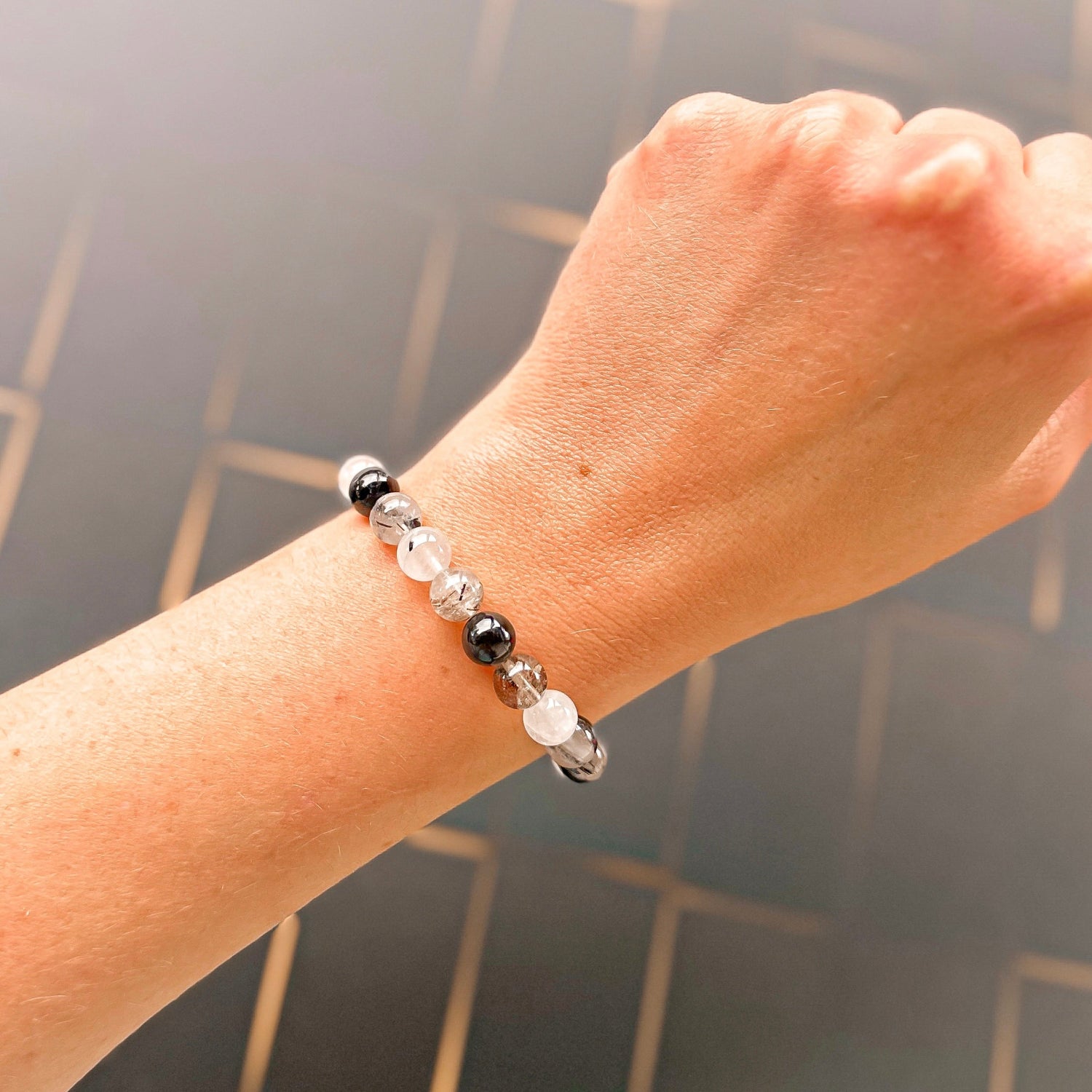 stacker bracelet from featherly in black rutilated quartz