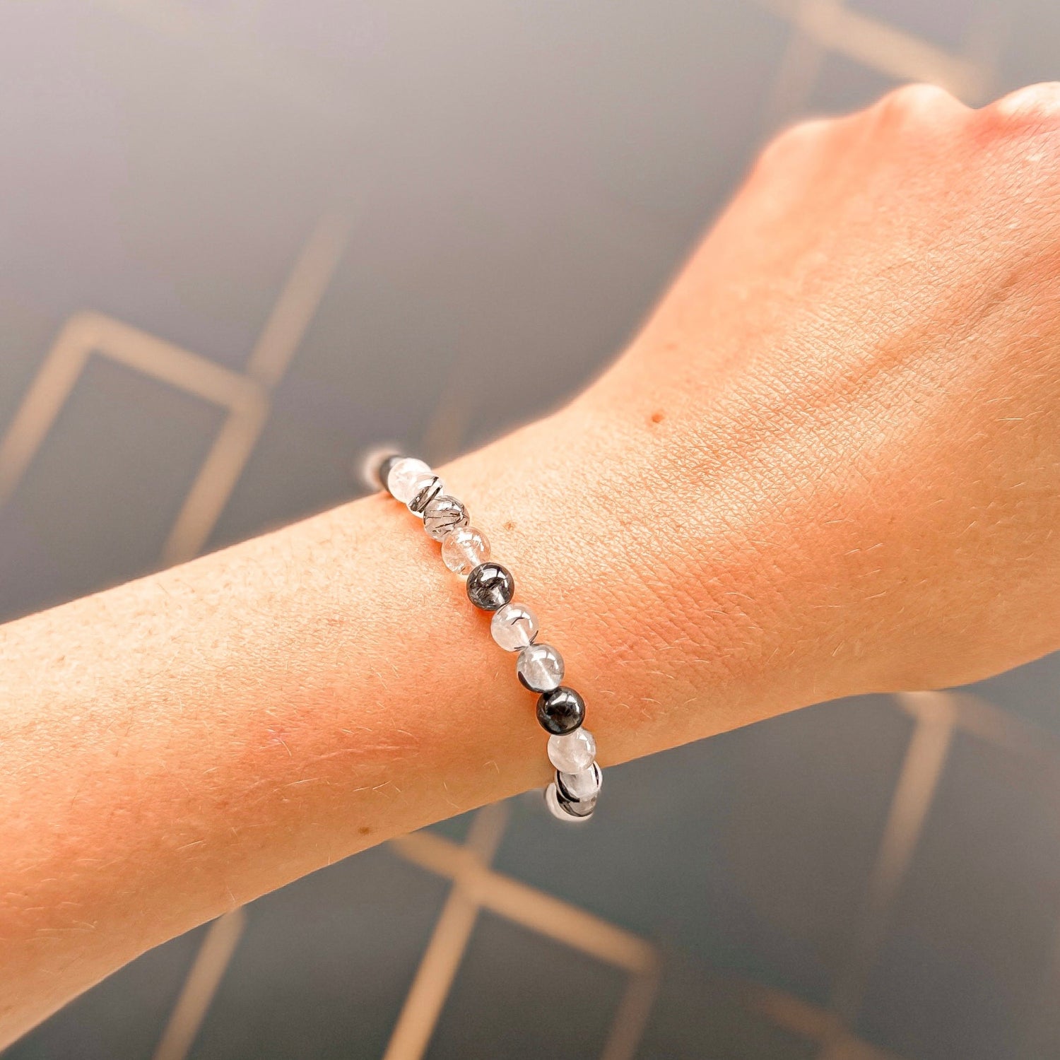 mini stacker bracelet from featherly in black rutilated quartz