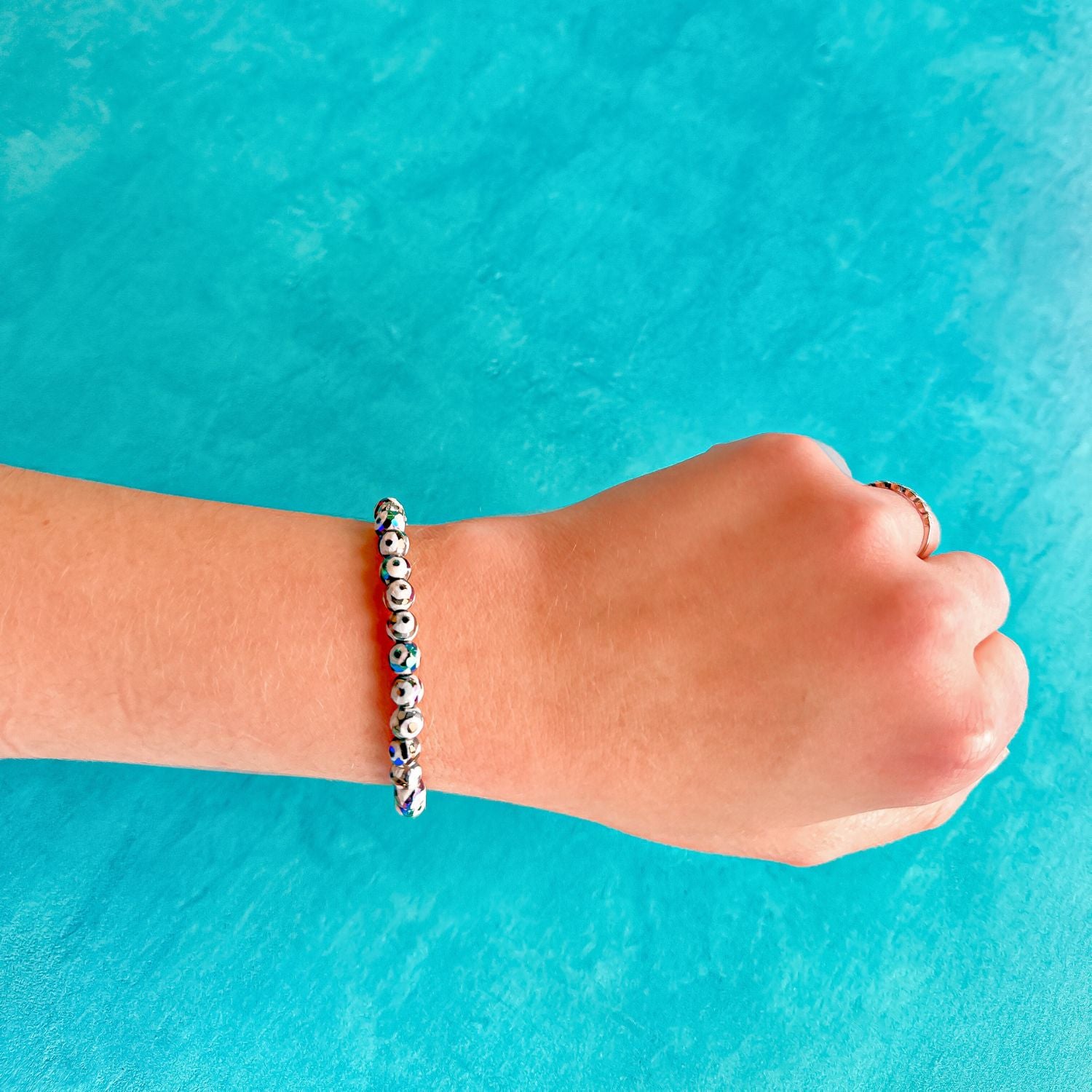 mini stacker bracelet from featherly in black evil eye tibetan agate