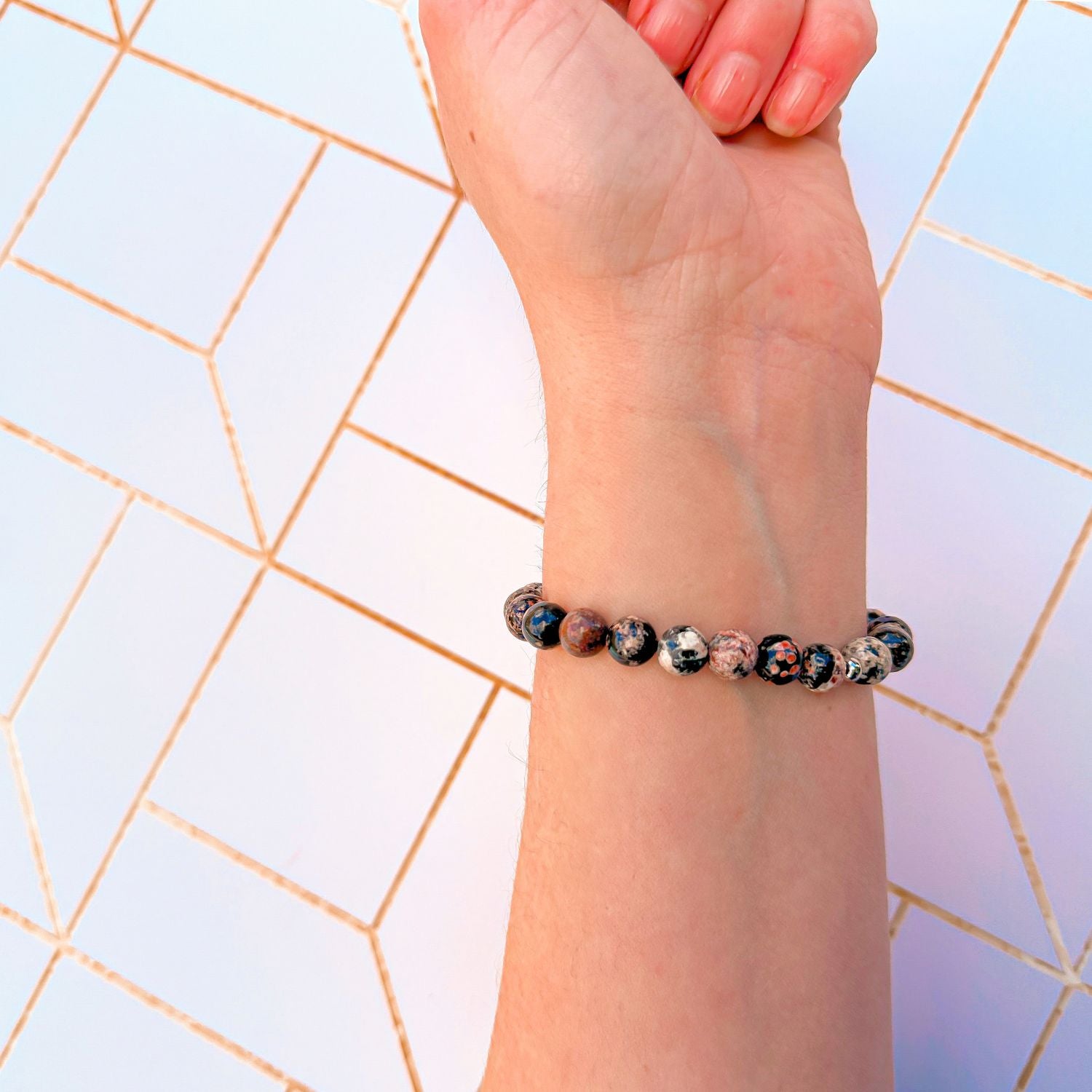 stacker bracelet from featherly in black leopard skin jasper
