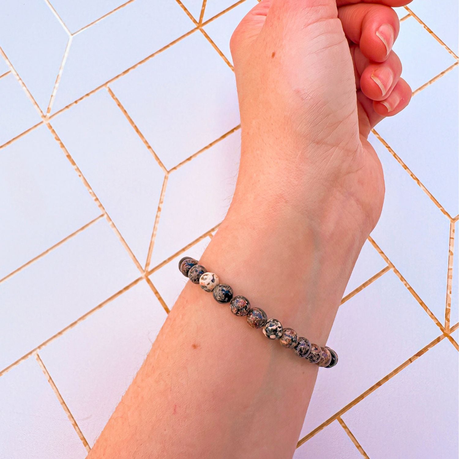 mini stacker bracelet from featherly in black leopard skin jasper