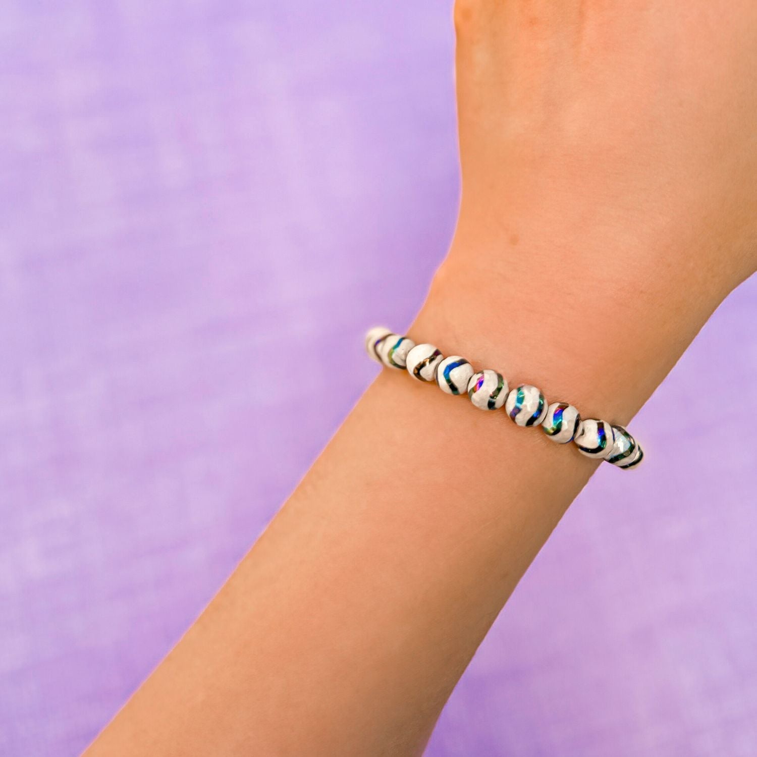 stacker bracelet from featherly in black wave tibetan agate