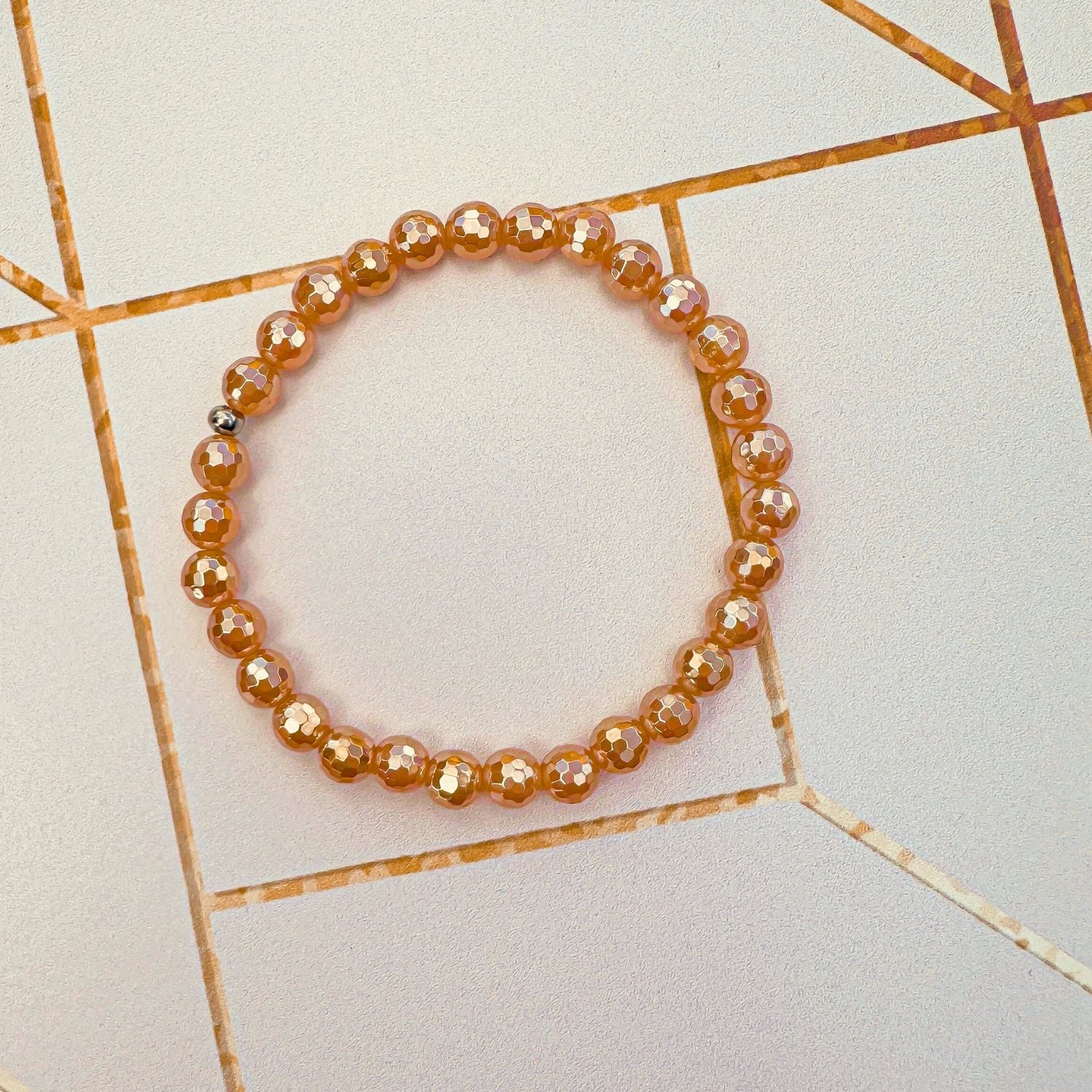 gold beaded bracelet in champagne agate