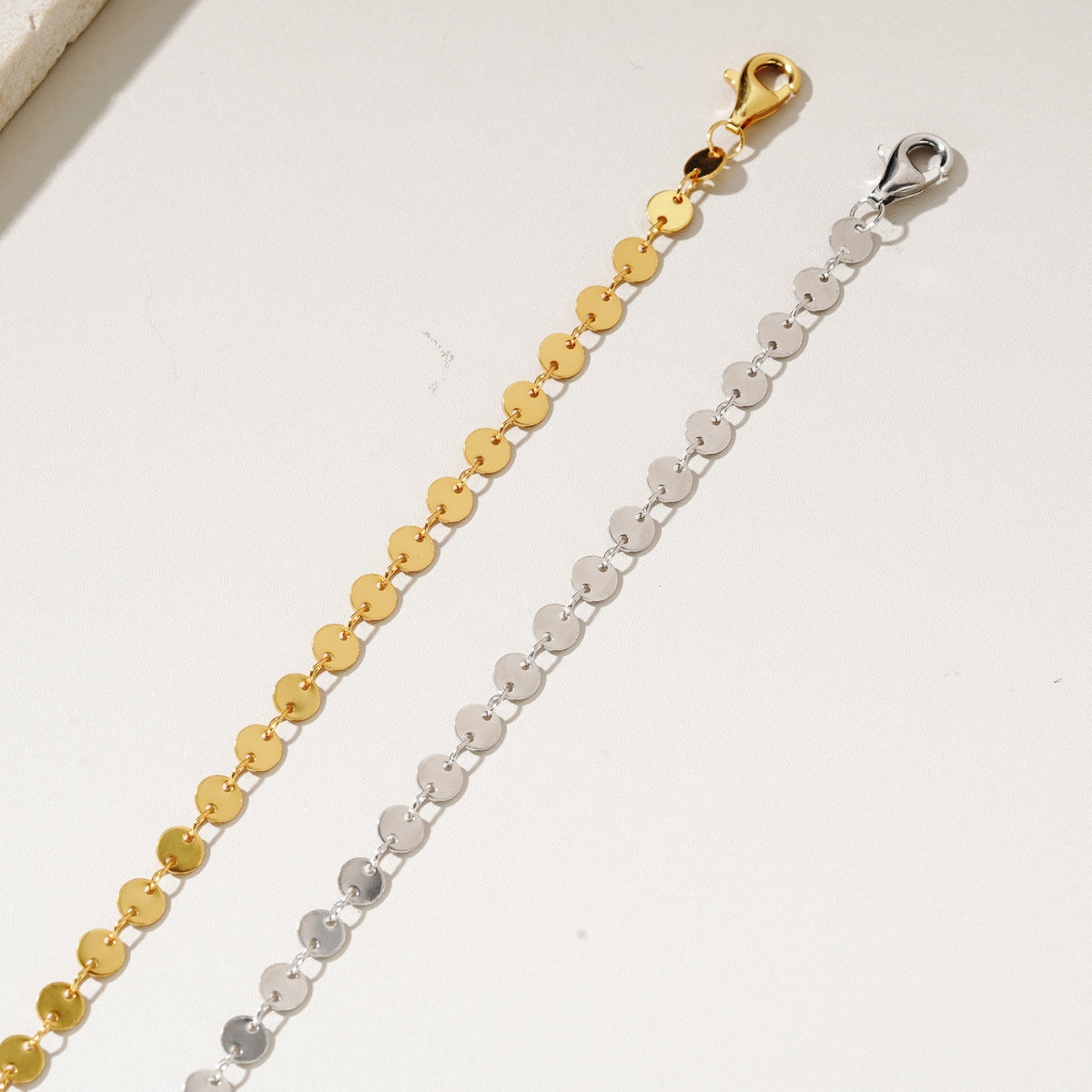 gold and silver necklace chains from Featherly jewelry