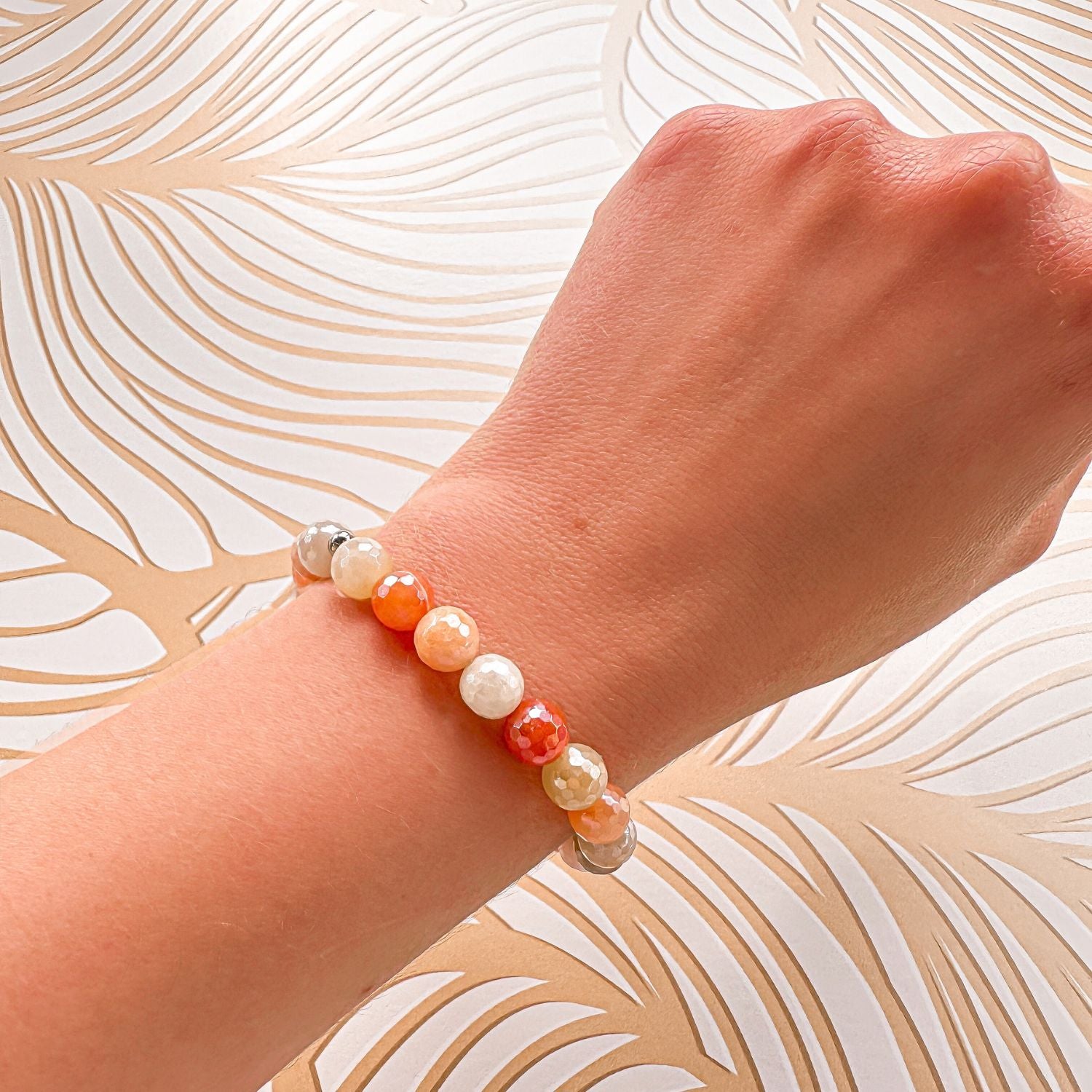 stacker bracelet from featherly in golden jade