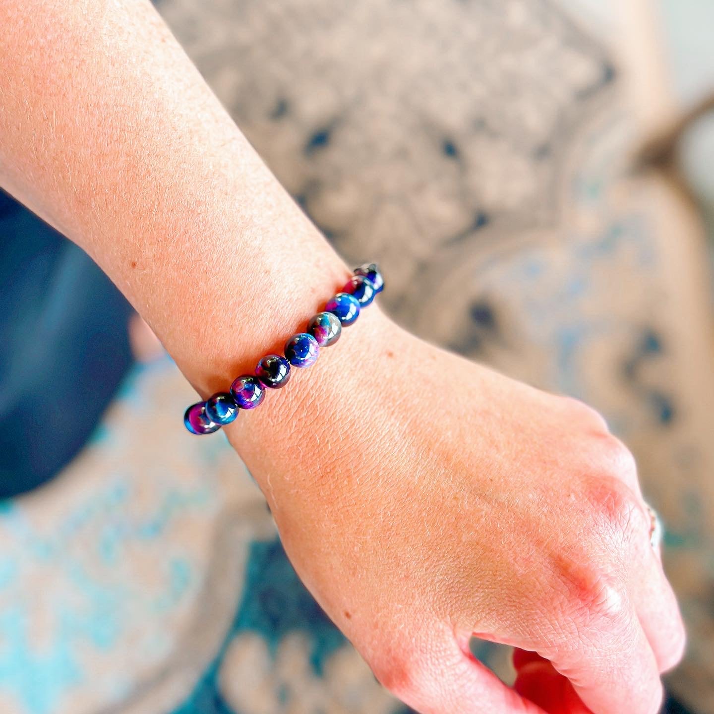 stacker bracelet from featherly in galaxy tiger's eye