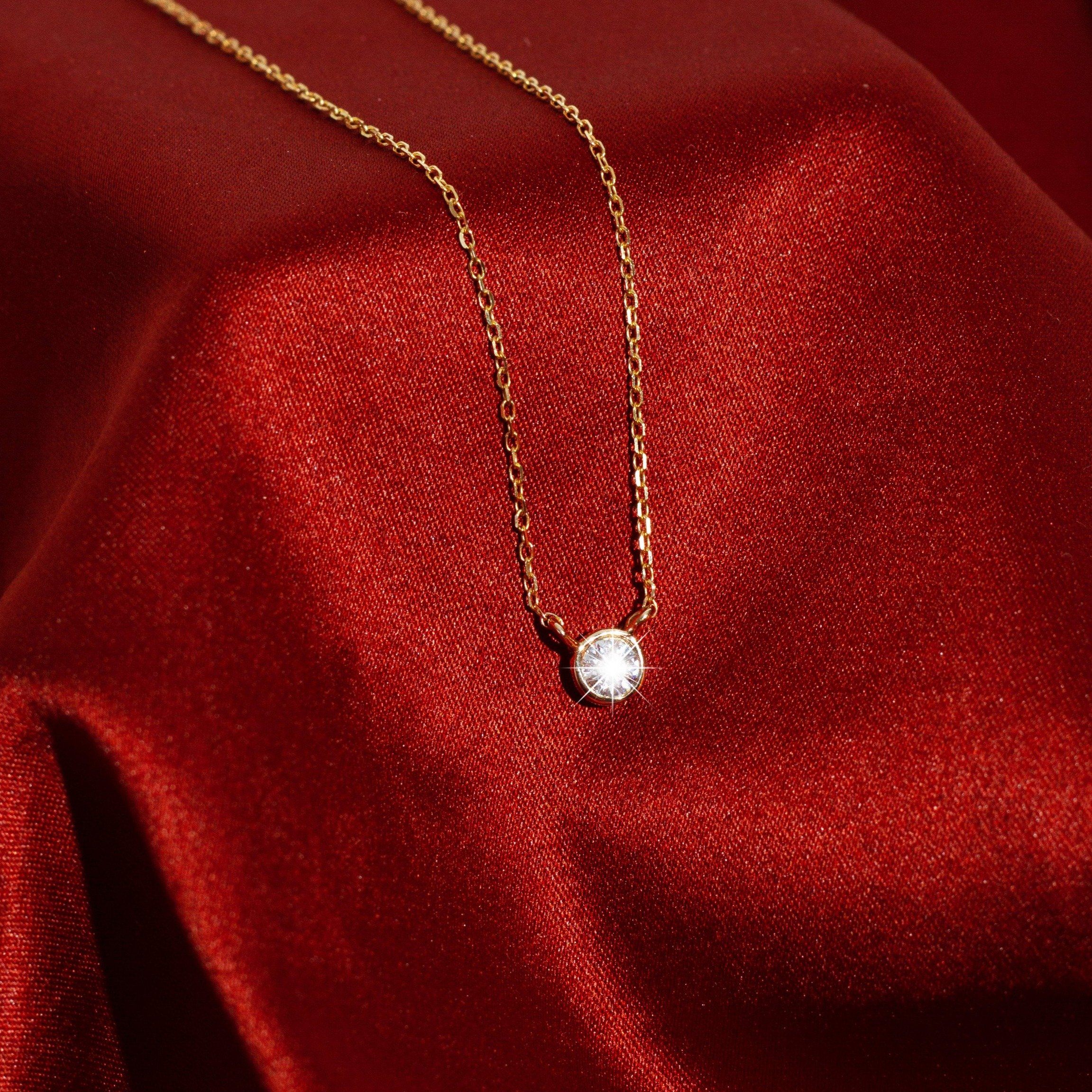 Featherly gold CZ bezel 16 inch to 18 inch necklace