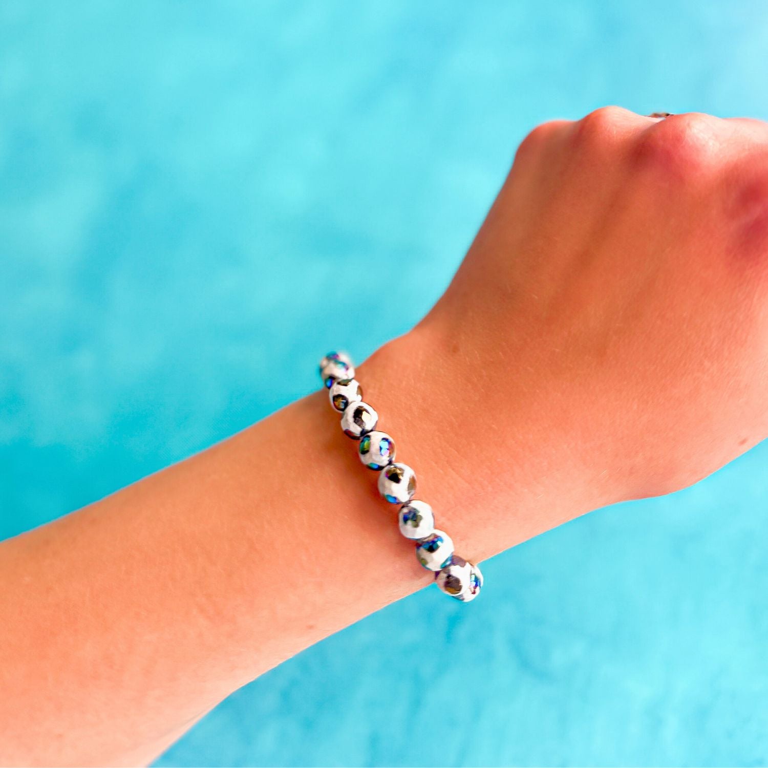 stacker bracelet from featherly in mystic black tibetan agate