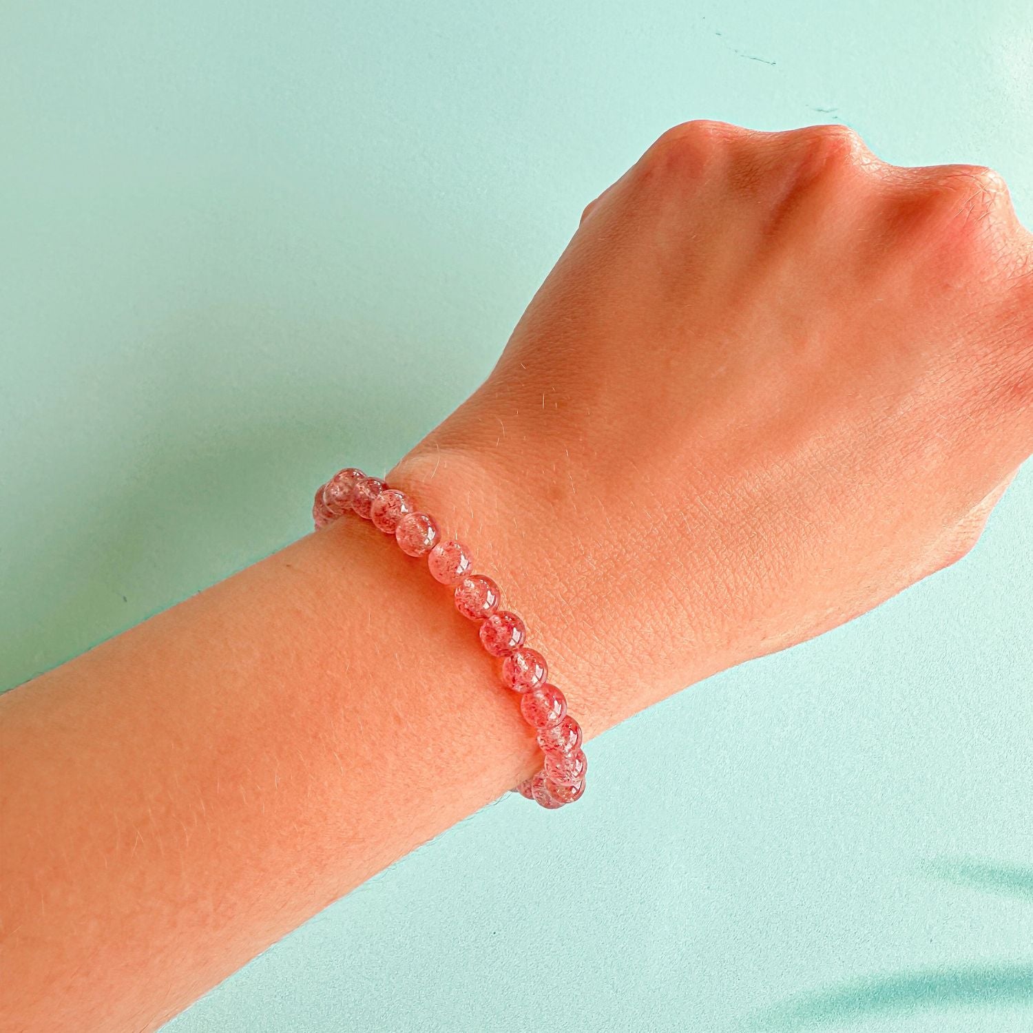 mini stacker bracelet from featherly in strawberry quartz