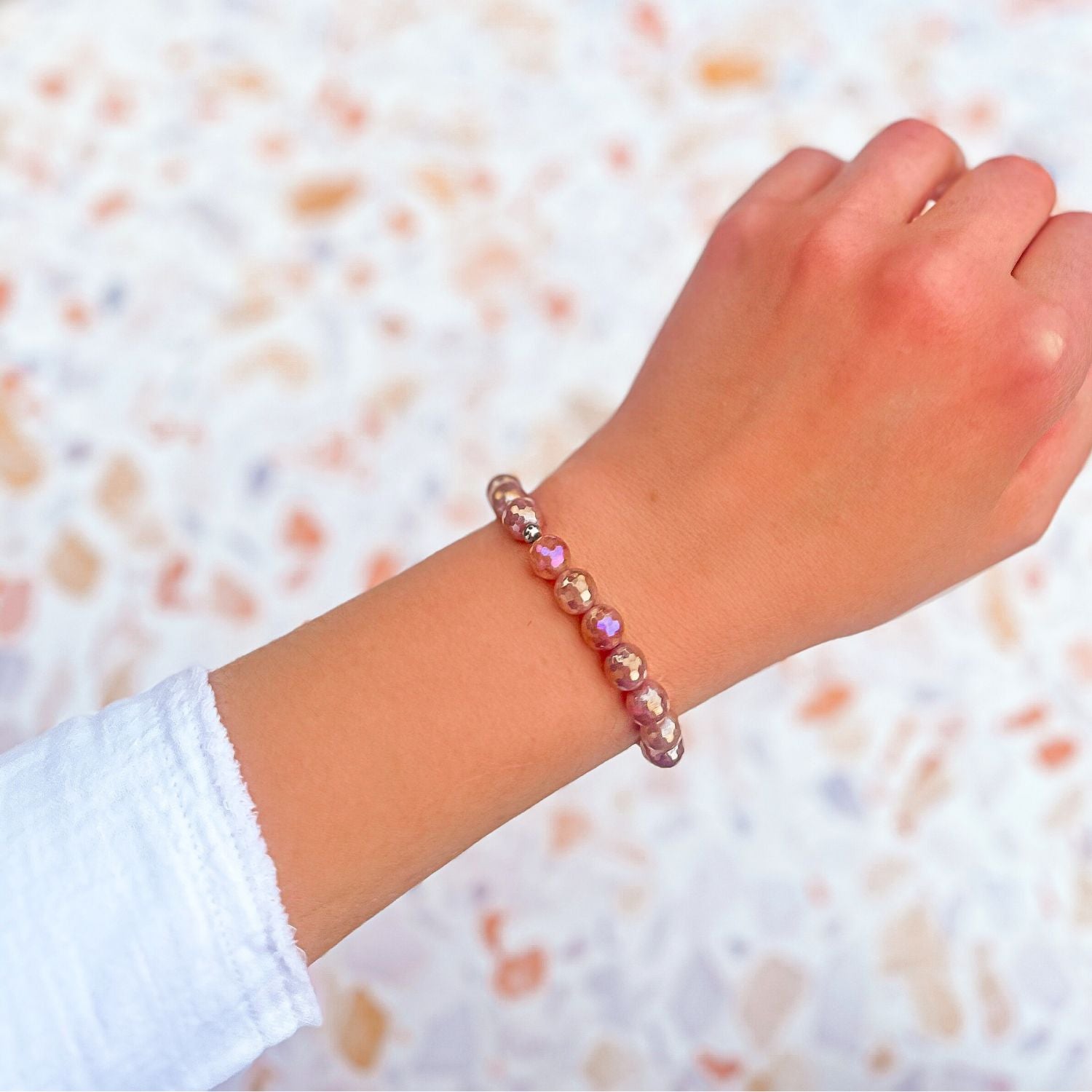 stacker bracelet from featherly in strawberry quartz
