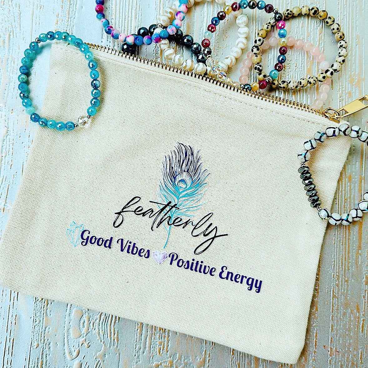 Featherly Jewelry Bag