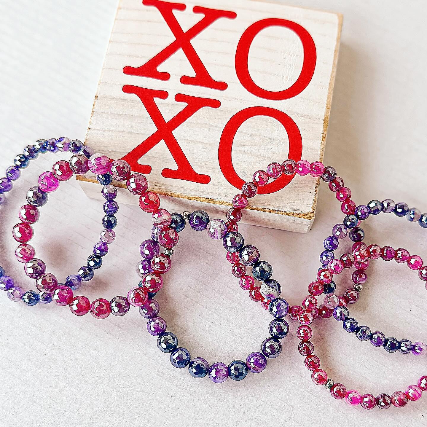 Pink agate and purple agate beaded bracelets from Featherly