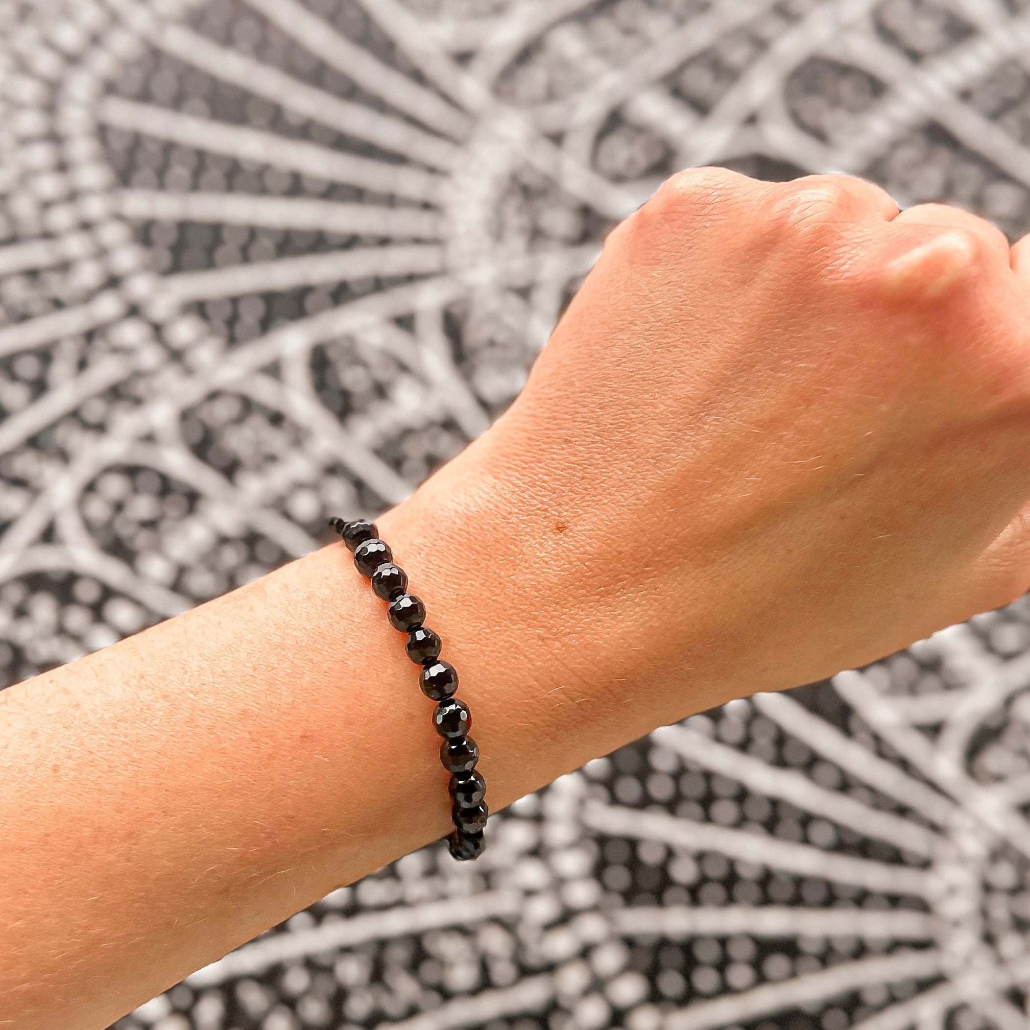 Featherly Black Onyx Faceted Mini Stacker Crystal Gemstone Beaded 
Bracelet on wrist