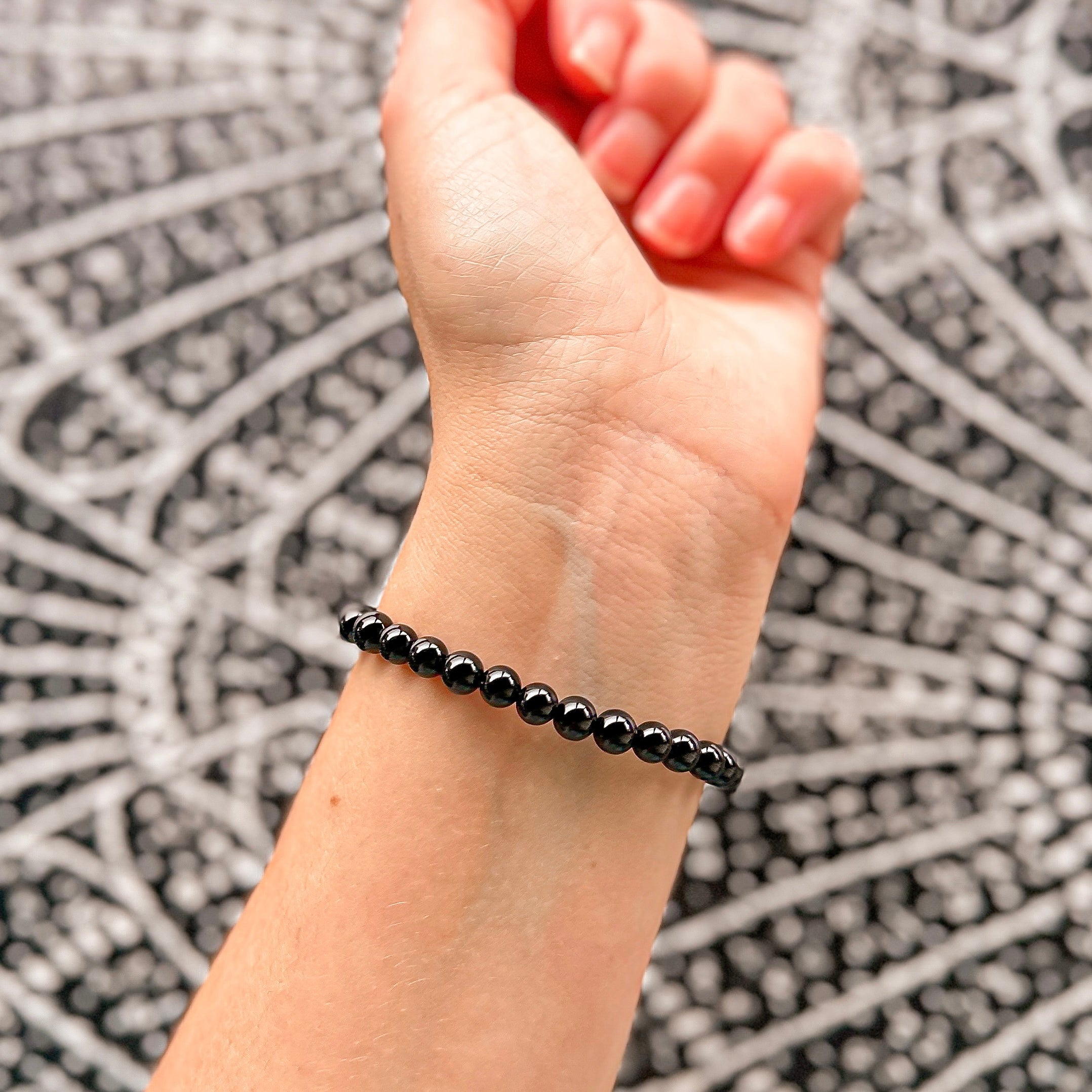 Featherly Black Onyx Mini Stacker Crystal Gemstone Beaded Bracelet on wrist