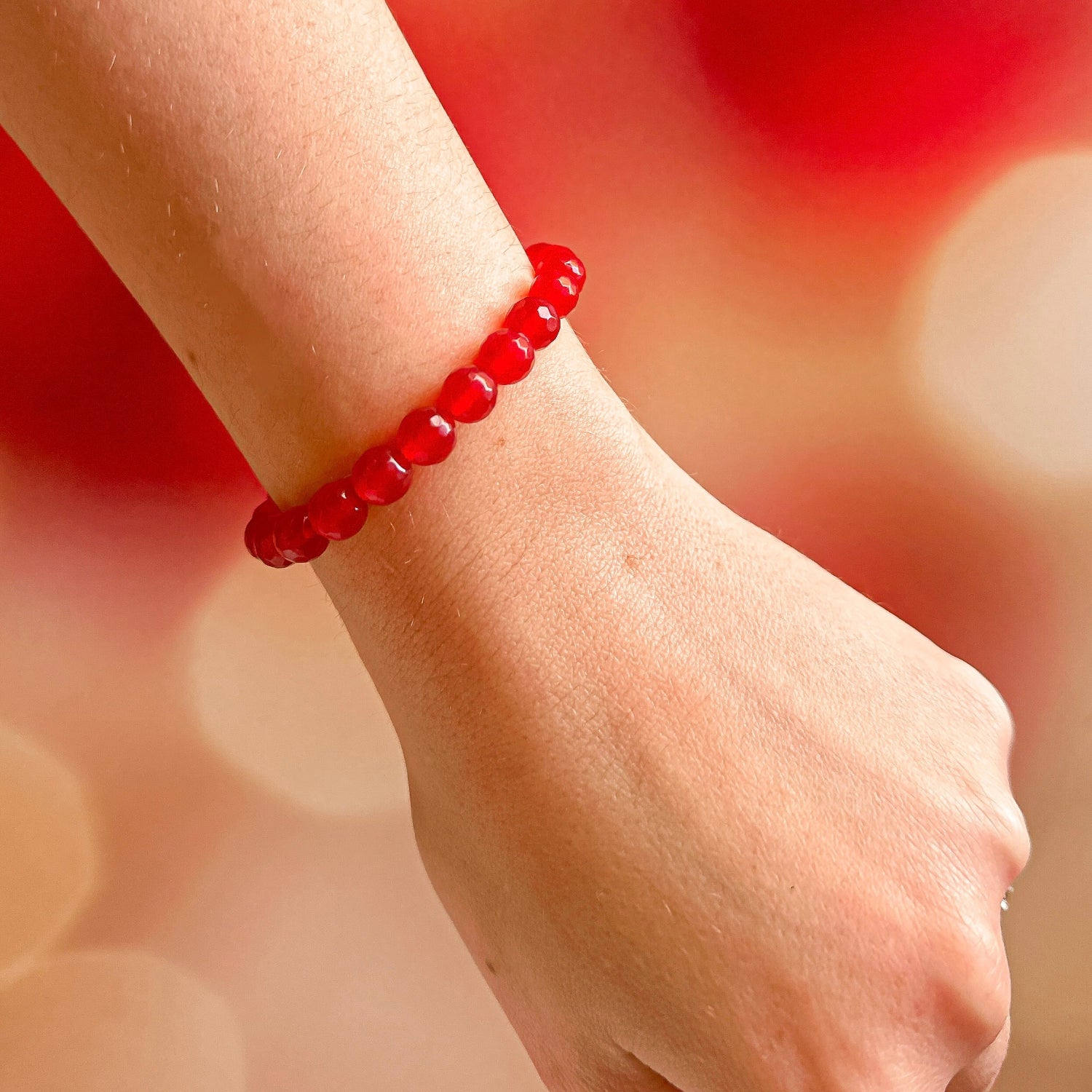 stacker bracelet from featherly in faceted red jade