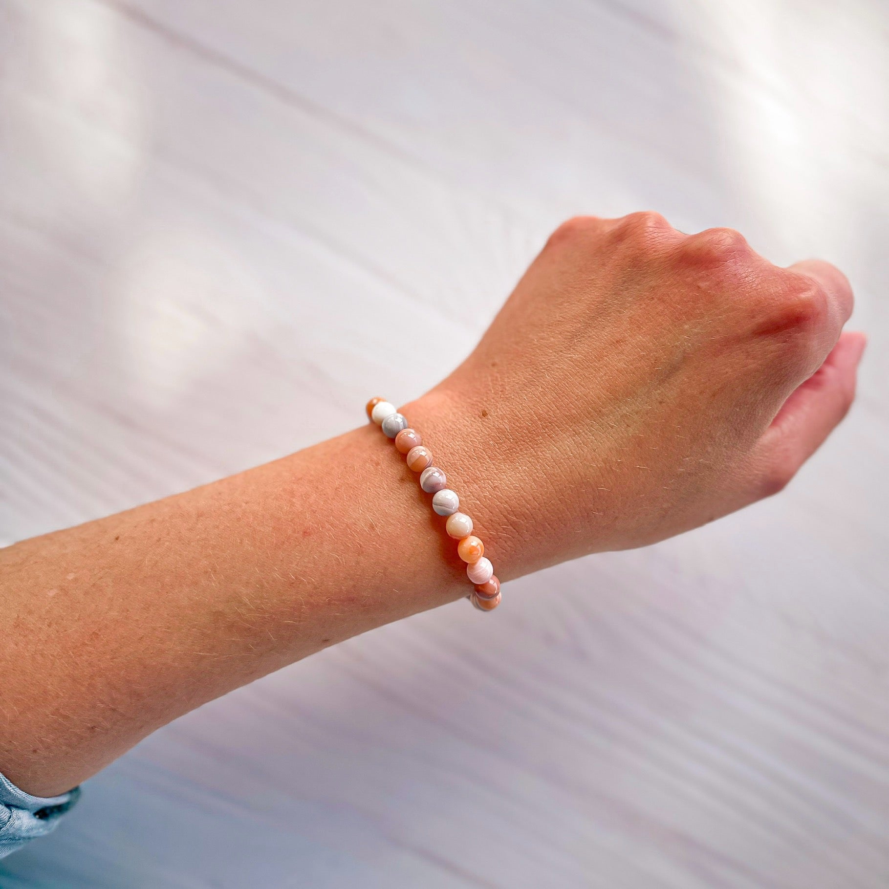 Featherly Pink Botswana Agate Mini Stacker Bracelet on wrist