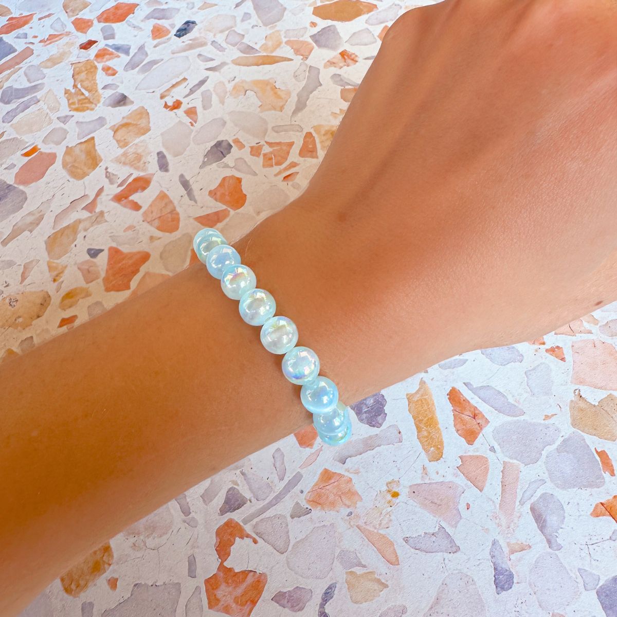 stacker bracelet from featherly in mystic aqua blue selenite