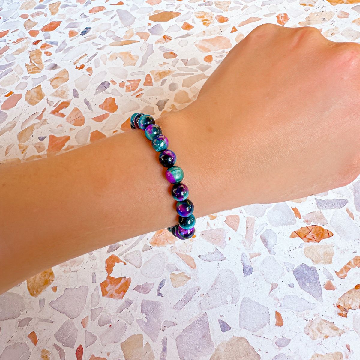 stacker bracelet from featherly in peacock tiger's eye