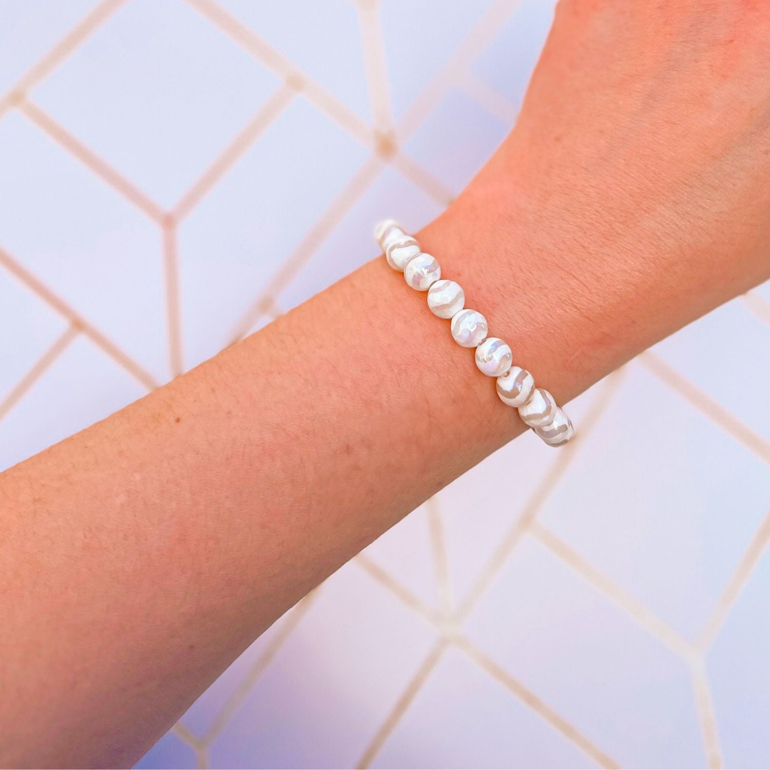 stacker bracelet from featherly in white wave tibetan agate